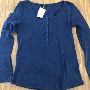 Long sleeved blue shirt